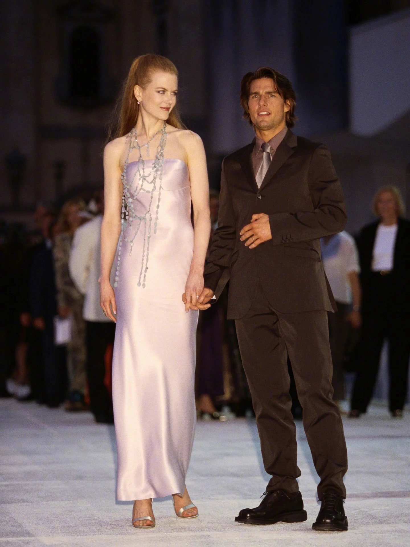 Elegant Lavender Satin Gown with Multi-Strand Necklace and Open-Toe Heels