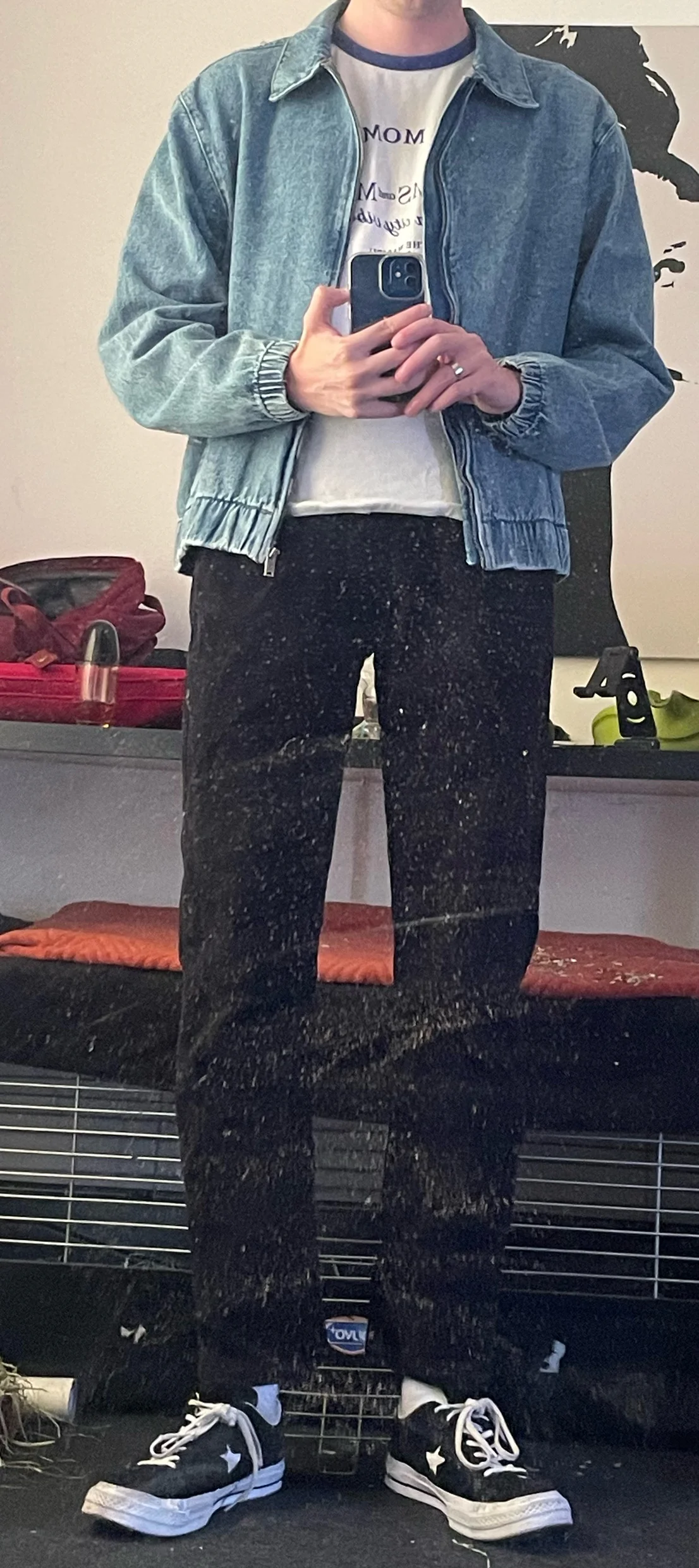 Casual Denim Jacket and Graphic Tee with Black Pants and Sneakers