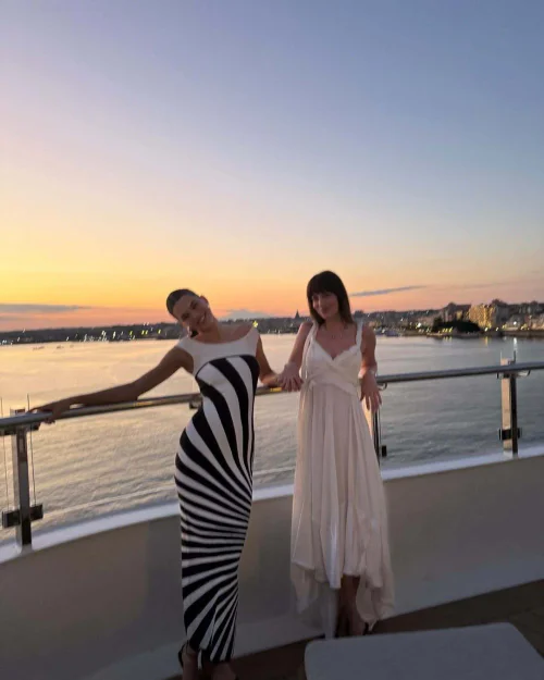 Bold Monochrome Striped Dress Meets Soft Ethereal White Gown