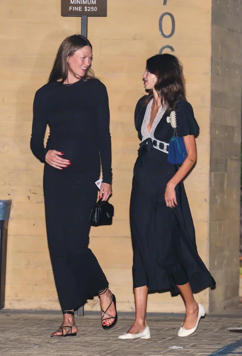 Elegant Black Dresses with Monochrome Accessories for Evening Sophistication
