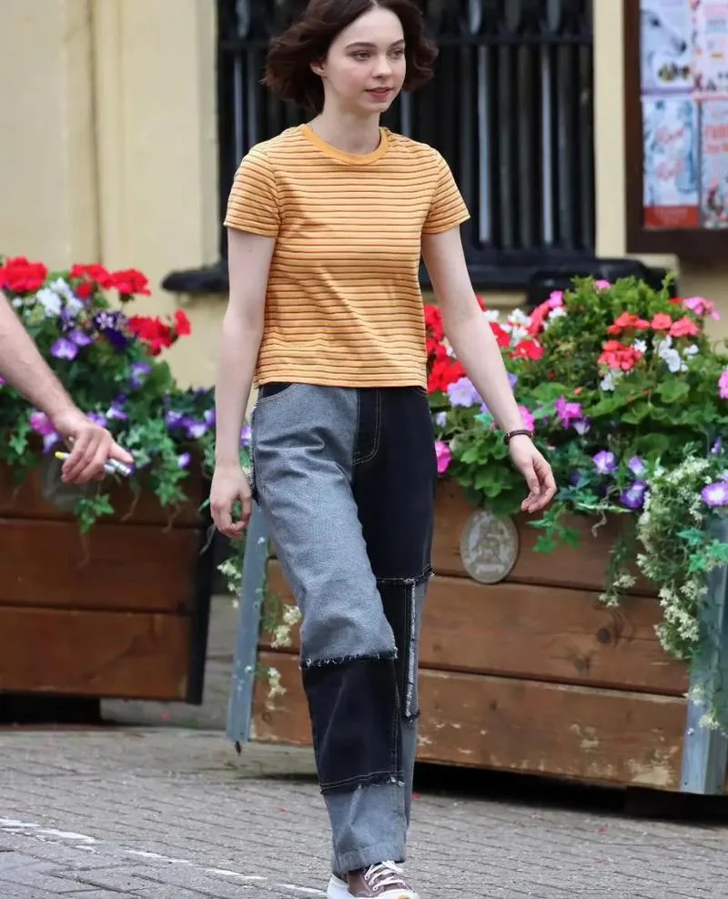 Casual Chic: Mustard Striped Tee with Patchwork Denim Jeans