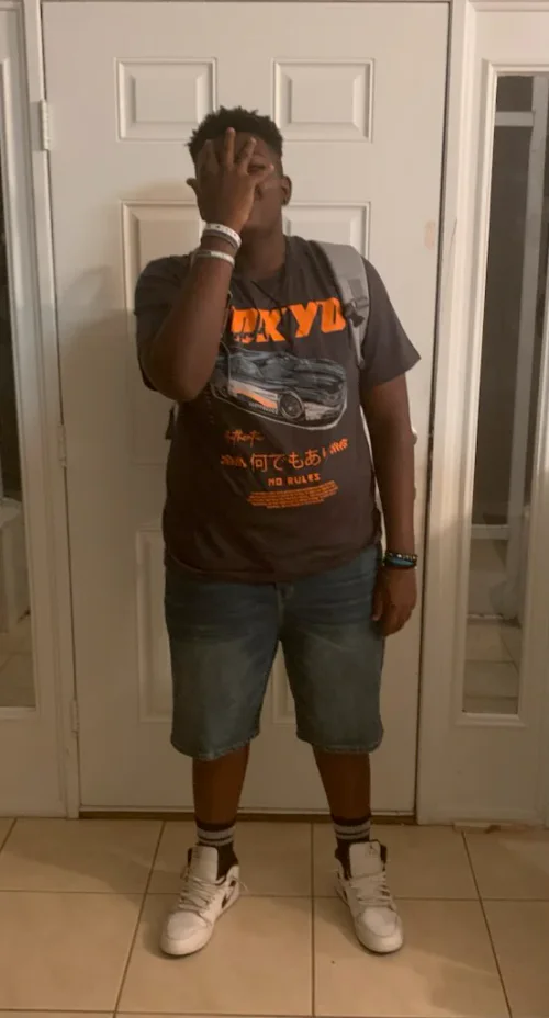 Casual Graphic Tee and Denim Shorts with White Sneakers and Accessories