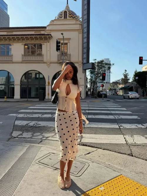 Elegant Cream Top and Polka Dot Skirt with Espadrilles for a Chic Urban Look
