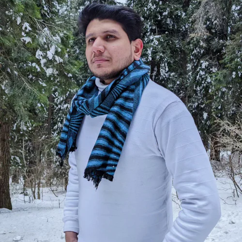 Classic White Sweater with Blue and Black Striped Scarf for Winter Style