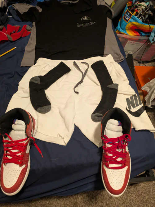 Casual Sporty Outfit with Red High-Tops and Nike Shorts