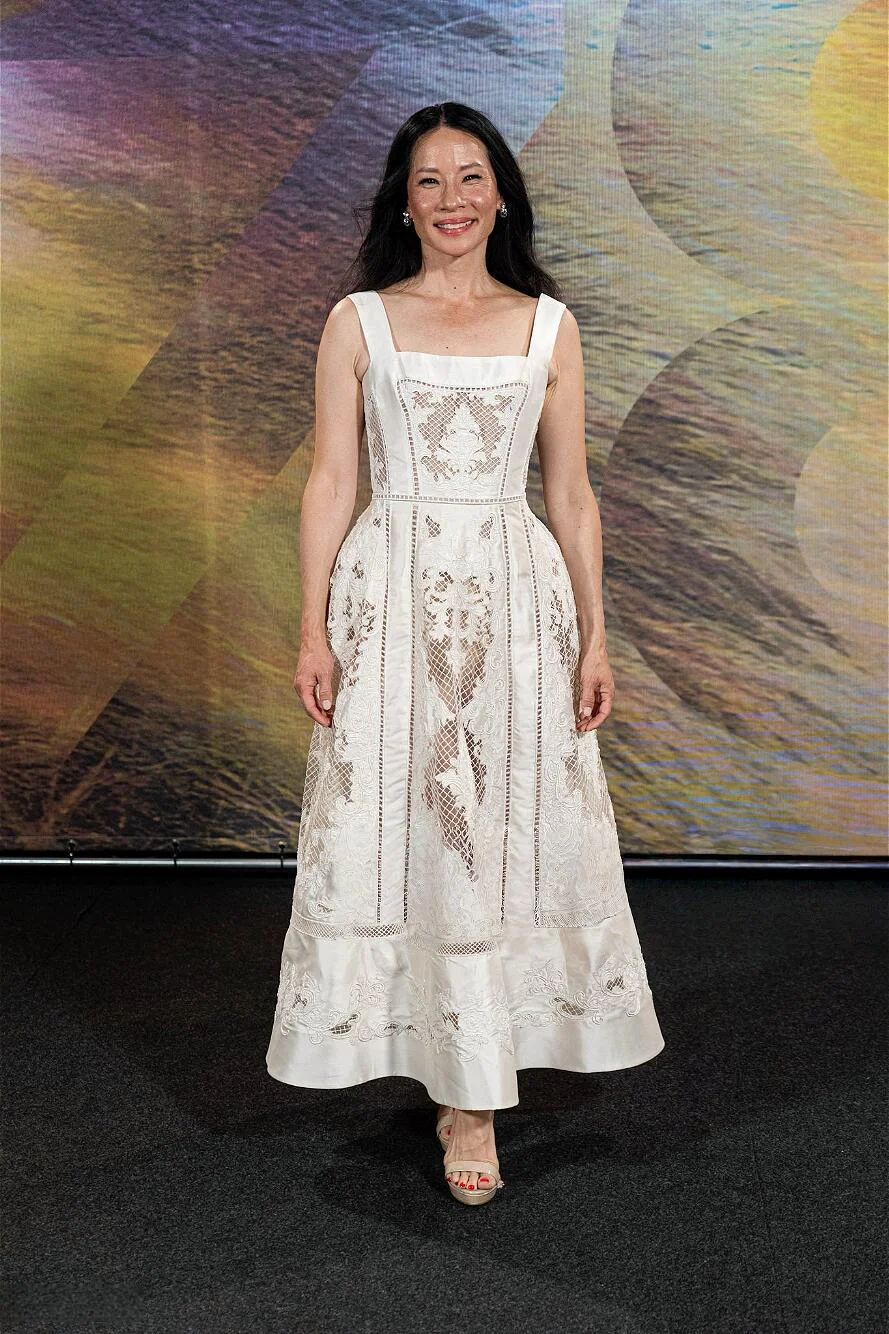 Elegant Off-White Lace Dress with Intricate Details and Classic Silhouette