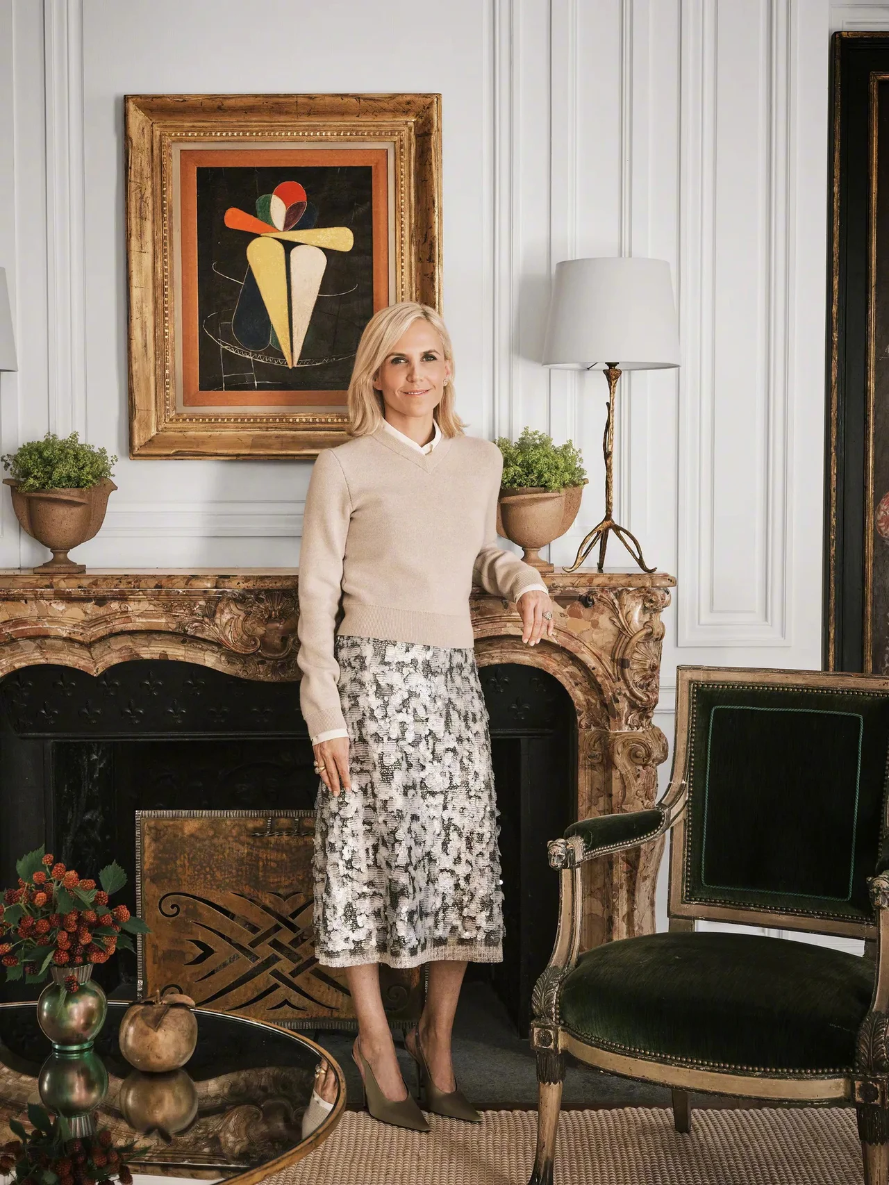 Elegant Neutral Outfit with Patterned Midi Skirt and Beige Sweater