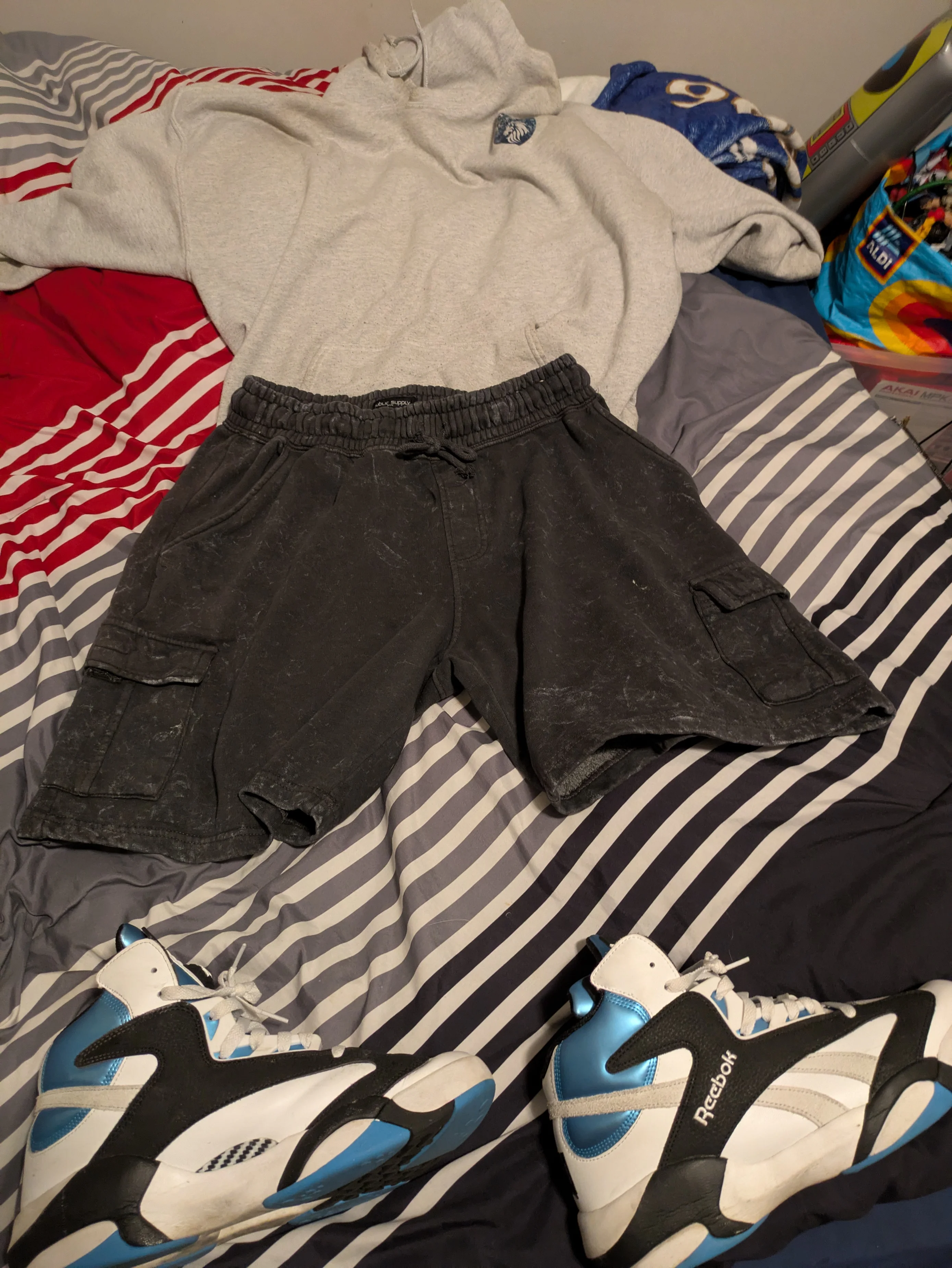 Casual Sporty Look with Light Gray Hoodie, Dark Cargo Shorts, and High-Top Sneakers
