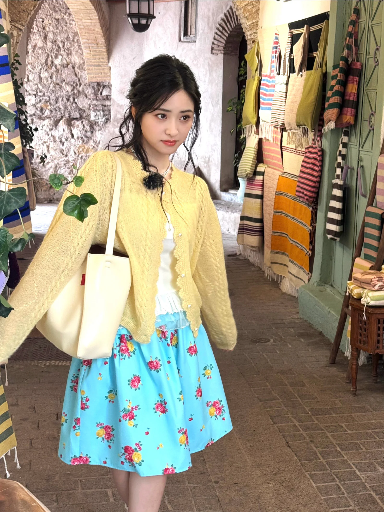 Vibrant Yellow Cardigan with Blue Floral Skirt: A Cheerful Weekend Look