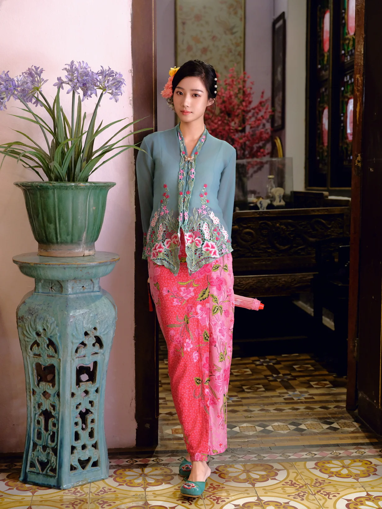Vibrant Teal and Pink Traditional Outfit with Embroidered Details