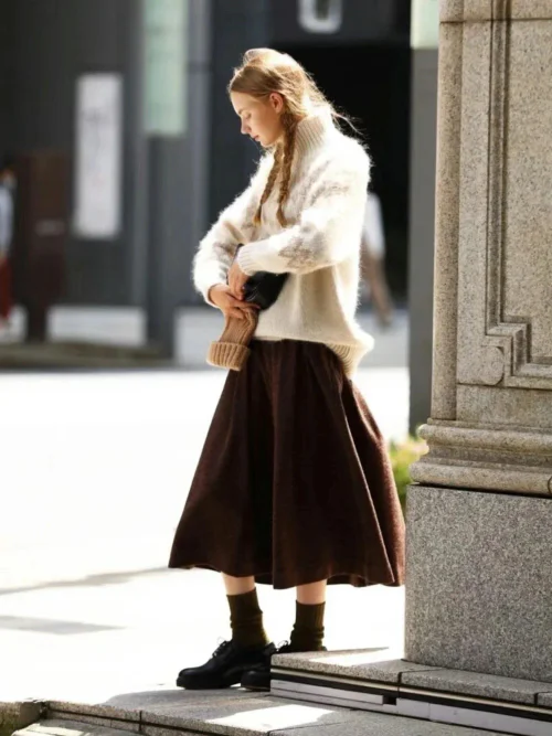 Cozy Chic with a Cream Sweater and Earthy Brown Skirt