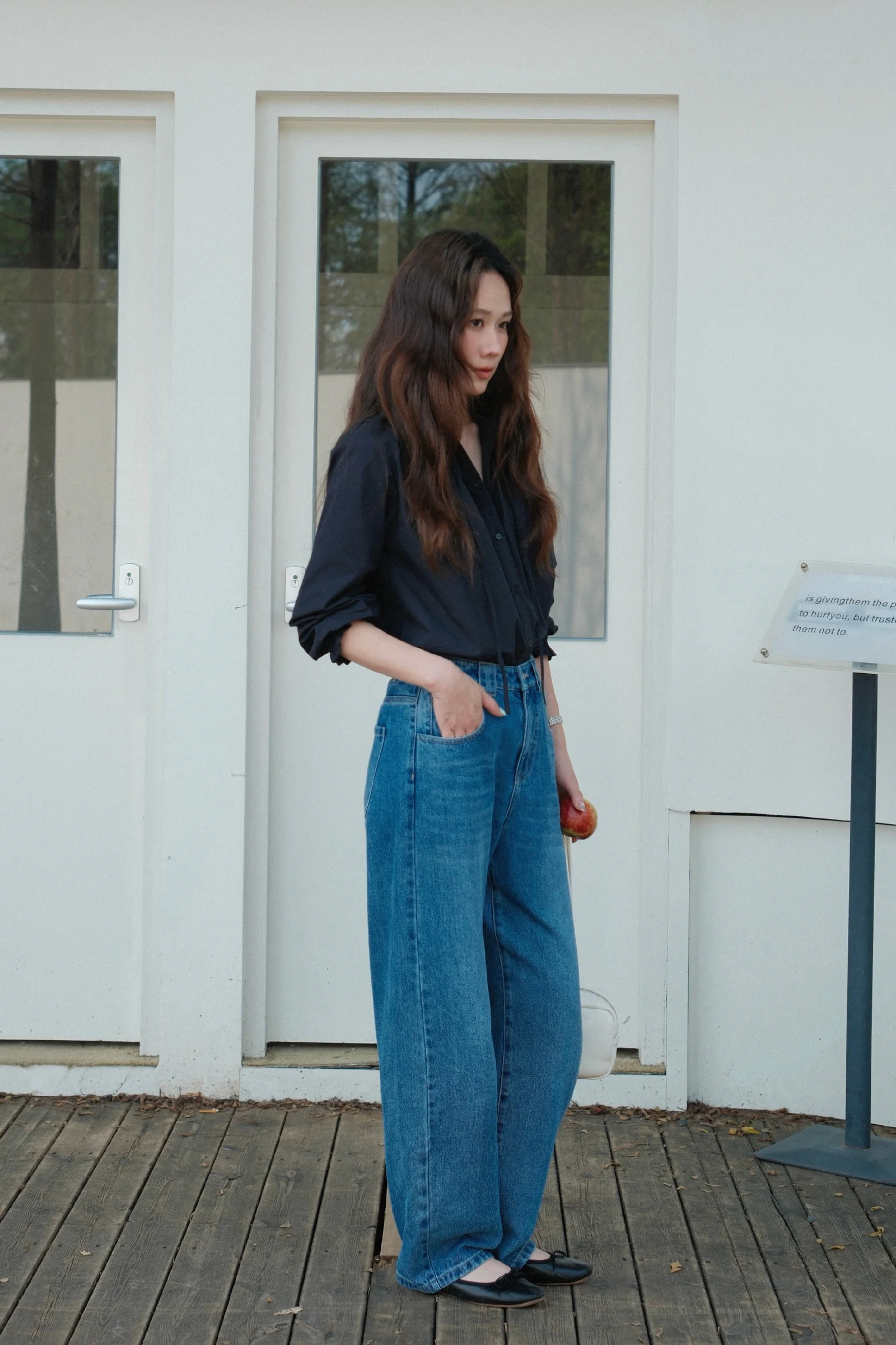 Classic Black Button-Up with Retro High-Waisted Denim