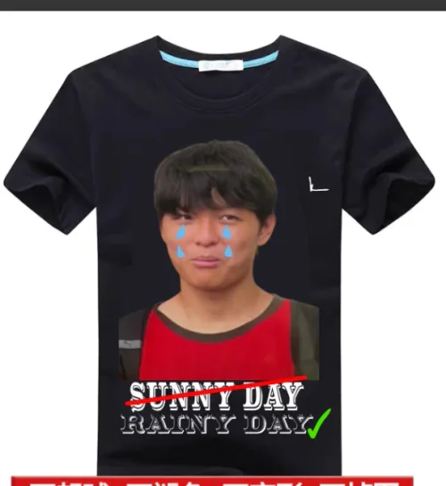 Emo Humor Gone Awry: Black Tee with Cheesy Graphics and Contrasting Patch