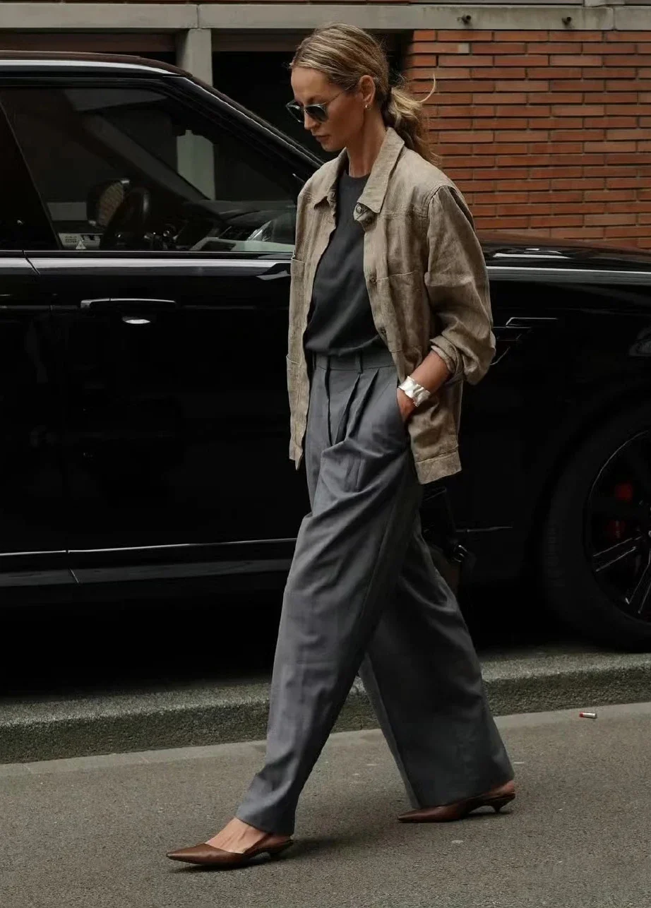 Effortless Chic: Beige Jacket and Grey Trousers with Neutral Accents