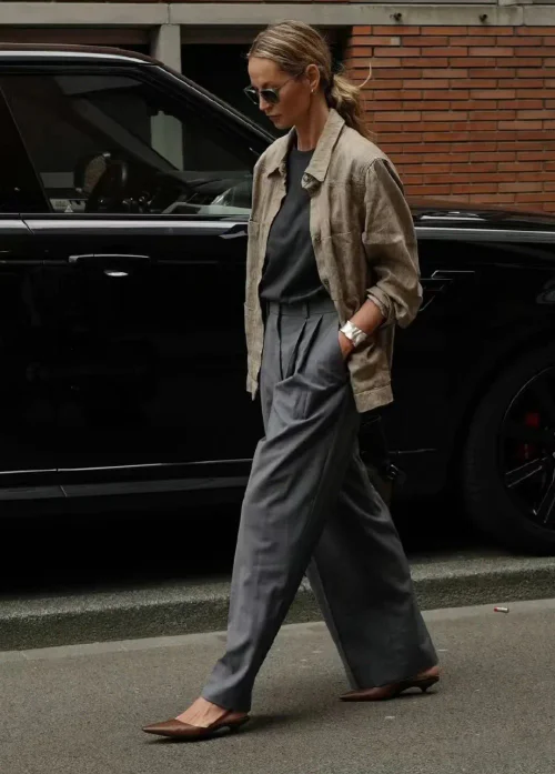 Effortless Chic: Beige Jacket and Grey Trousers with Neutral Accents