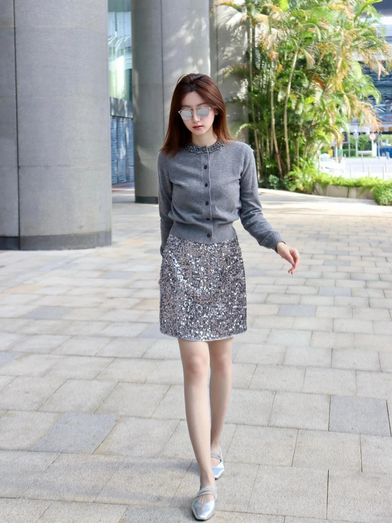 Elegant Grey Cardigan Paired with Shimmering Sequined Mini-Skirt