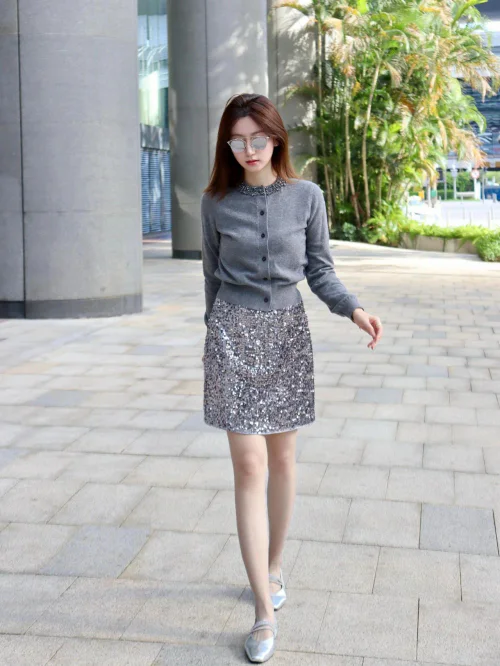 Elegant Grey Cardigan Paired with Shimmering Sequined Mini-Skirt