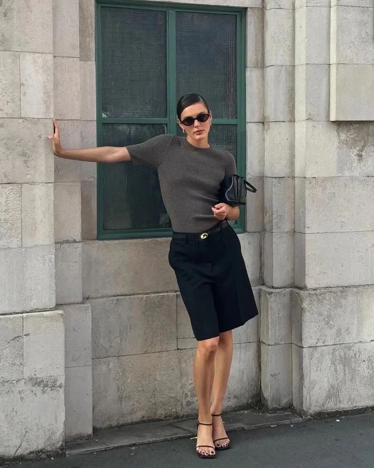 Chic Neutral Tones: Gray Top and Black Shorts Ensemble with Elegant Accessories