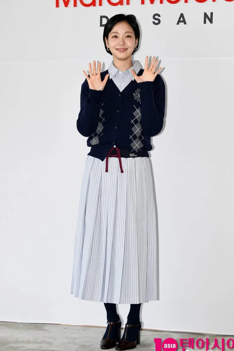 Elegant Navy Cardigan with Argyle Pattern and Striped Dress for a Preppy Style