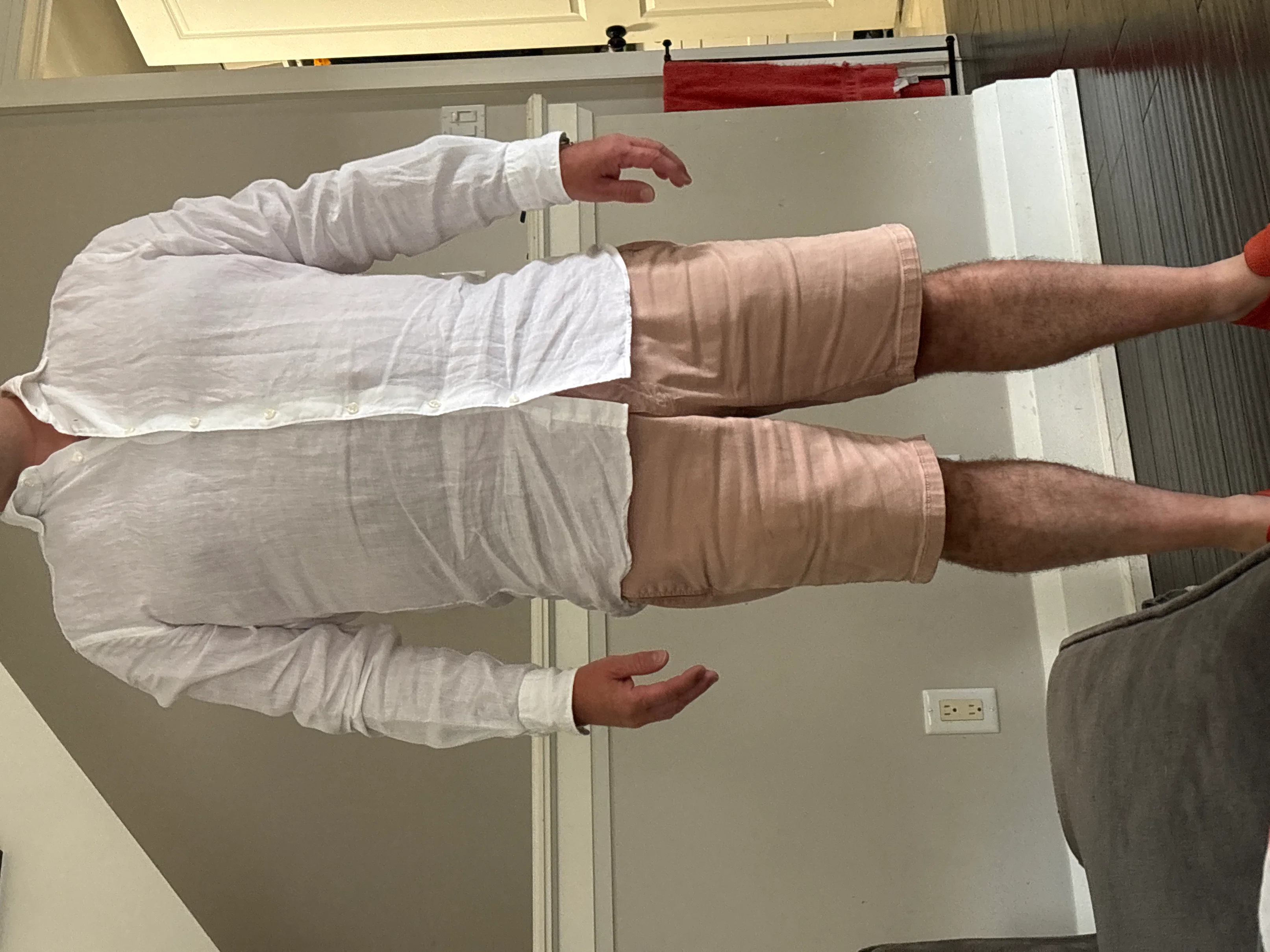 Classic White Shirt and Light Pink Shorts for a Fresh Summer Look