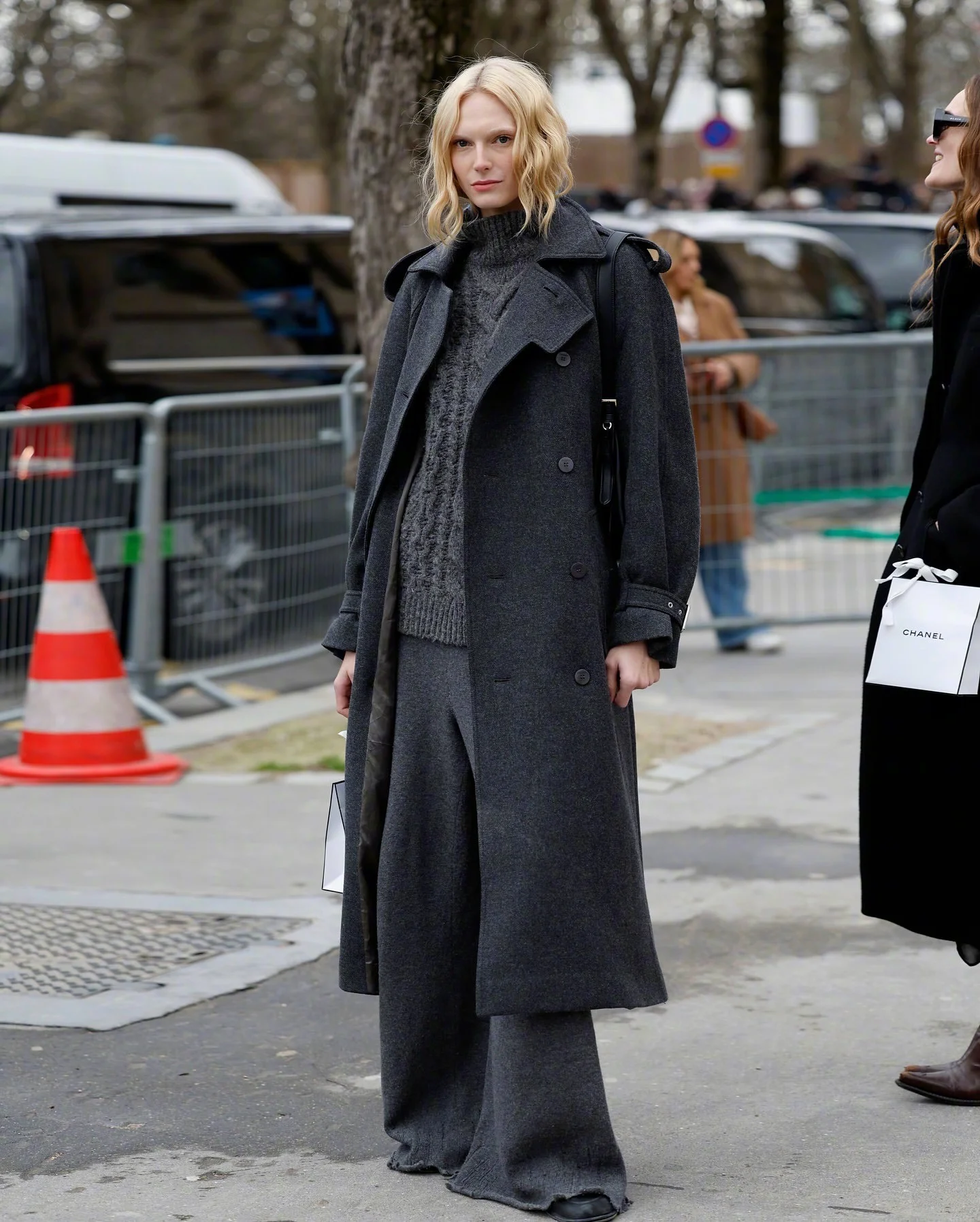Monochrome Elegance: Sophisticated Gray Overcoat with Knit Sweater and Wide-Leg Trousers