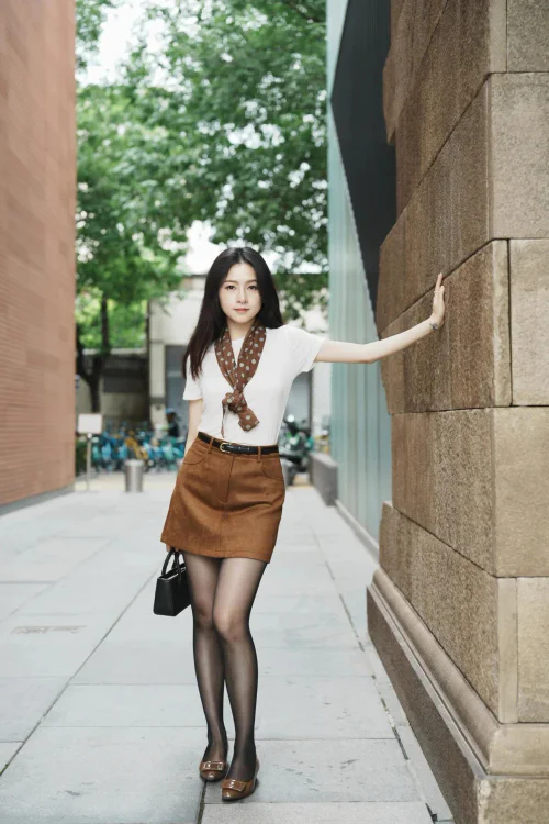 Chic White Top with Brown Mini Skirt and Patterned Scarf