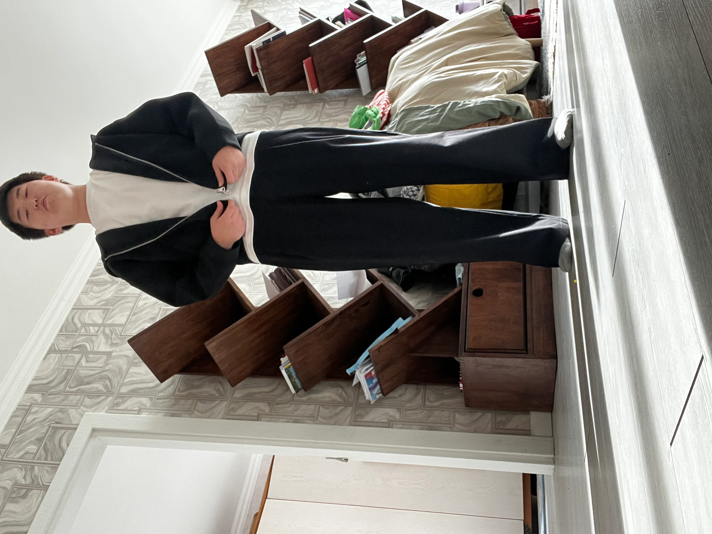 Minimalist Black Jacket and Trousers with Casual Neutral Top