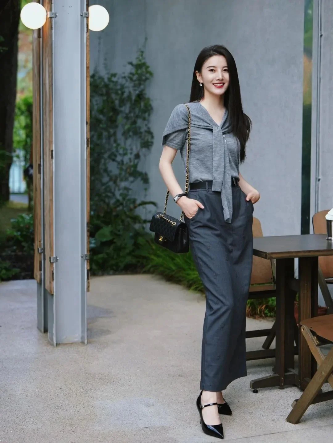 Chic Gray Ensemble with Tailored Trousers and Tie-Detail Top