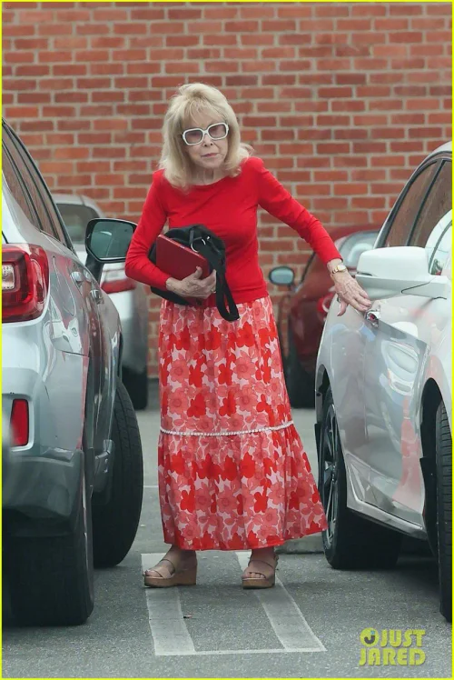 Vibrant Red & Floral Ensemble with Elegant Long-Sleeve Top and Skirt