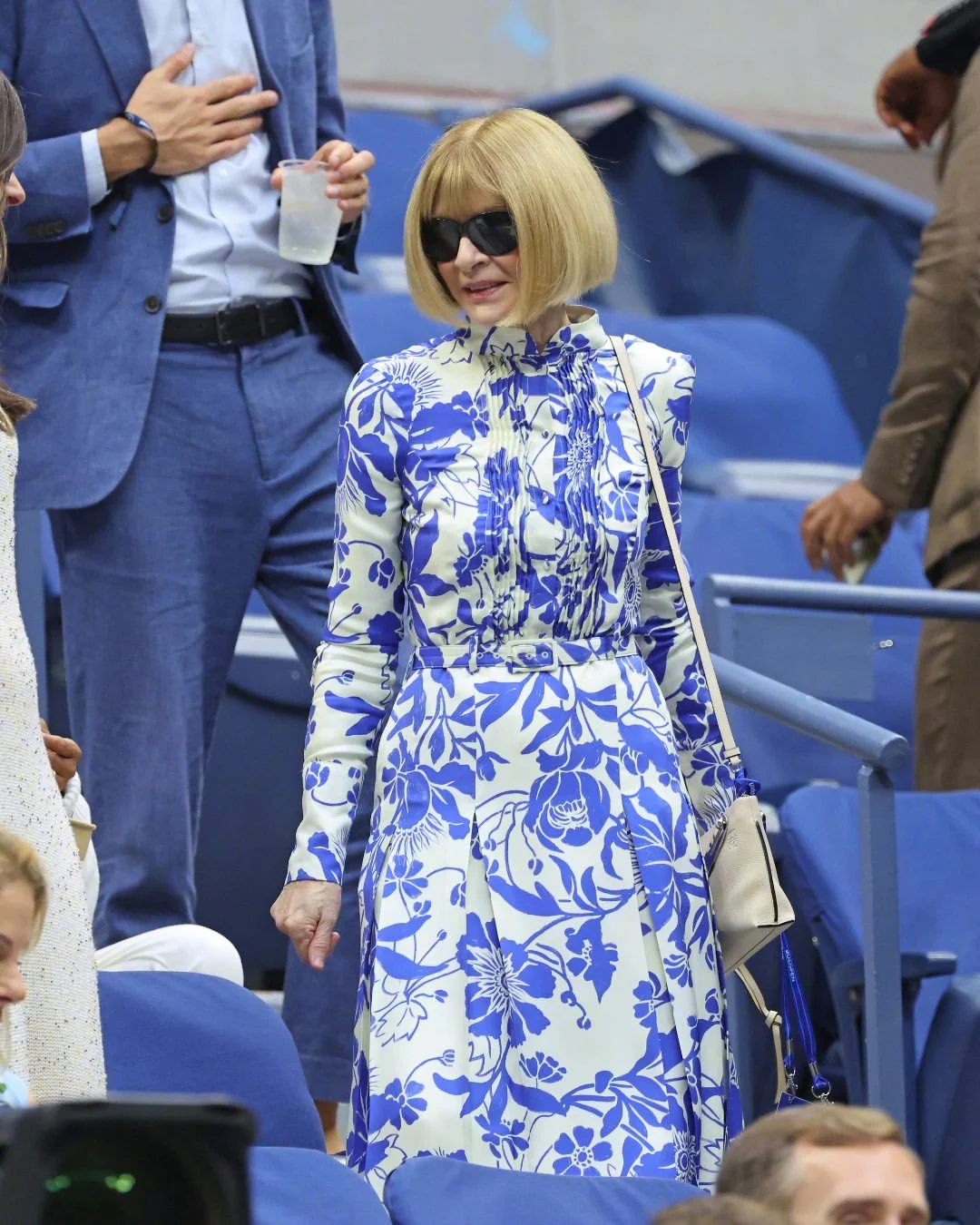 Striking Blue and White Floral Dress With Elegant Accessories