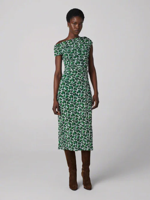 Chic Green Patterned Dress with Asymmetrical Neckline and Brown Boots