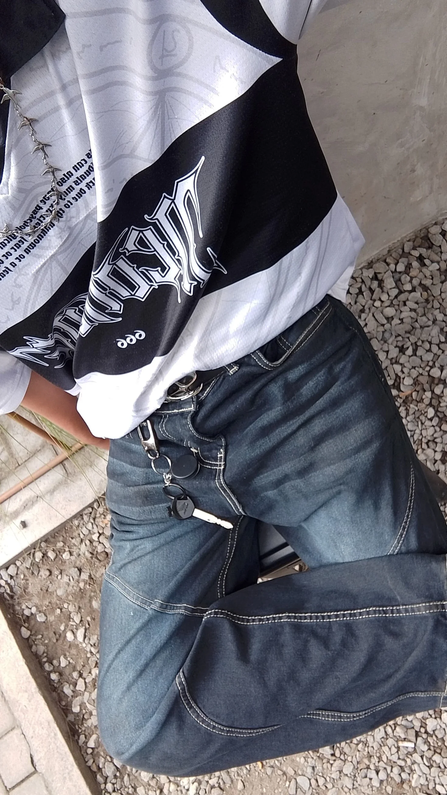 Bold Monochrome Streetwear Style with Graphic Tee and Denim