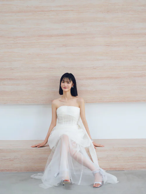Elegant White Strapless Dress with Sheer Overlay for a Chic Formal Look