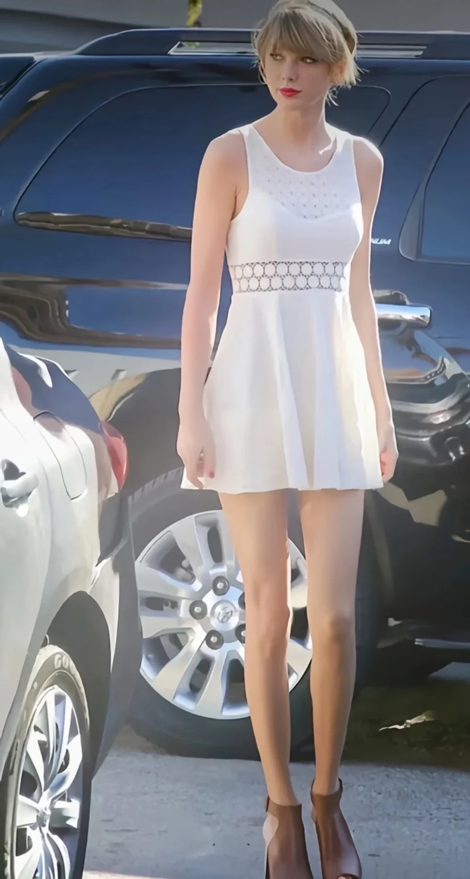 #Taylor Swift Outfit# Elegant White Summer Dress with Intricate Details Paired with Brown Ankle Boots
