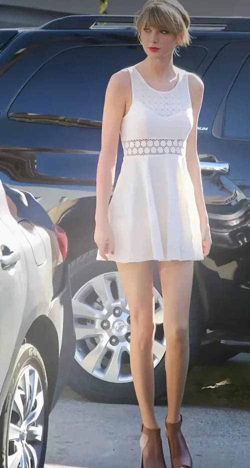 #Taylor Swift Outfit# Elegant White Summer Dress with Intricate Details Paired with Brown Ankle Boots