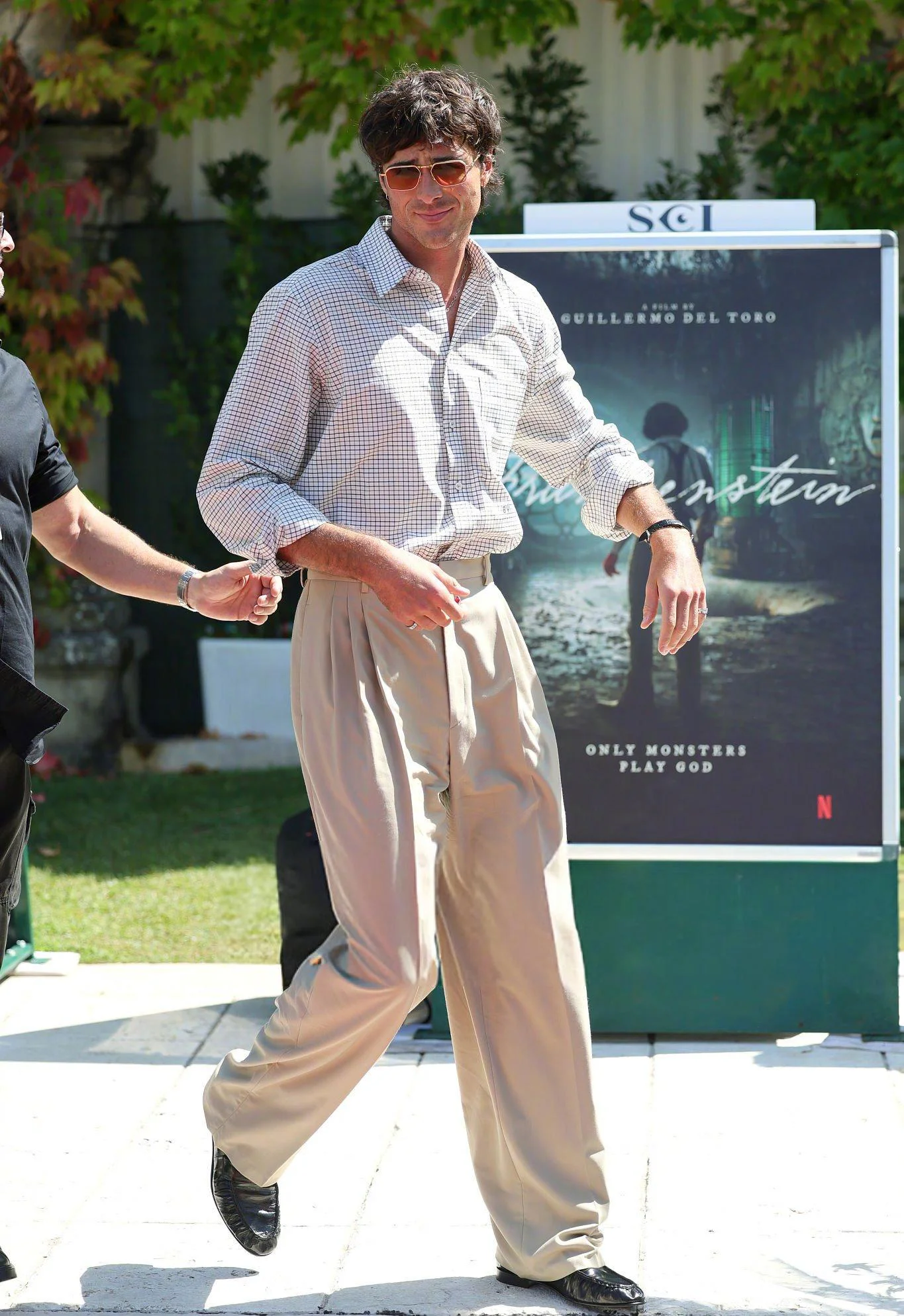 #Venice Film Festival# Classic Checkered Shirt with Relaxed Beige Trousers and Black Shoes
