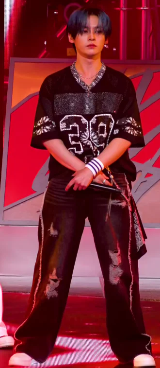 Edgy Sporty Style with Black Mesh Jersey and Distressed Wide-Leg Jeans