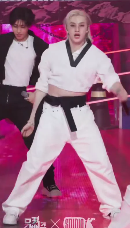 Dynamic Black and White Cropped Top with Oversized Pants for Modern Streetwear