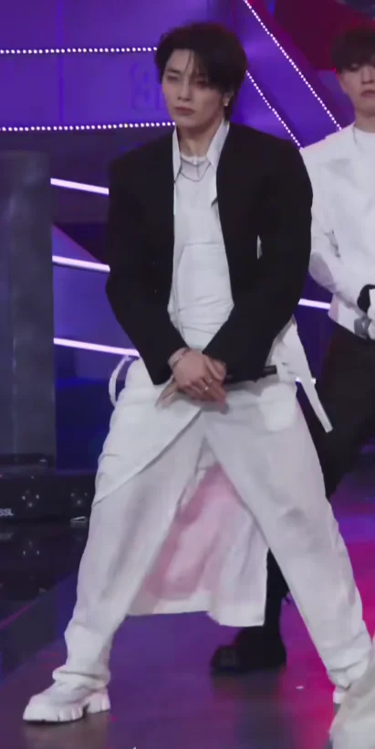 Bold Black and White Ensemble with Edgy Streetwear Influence