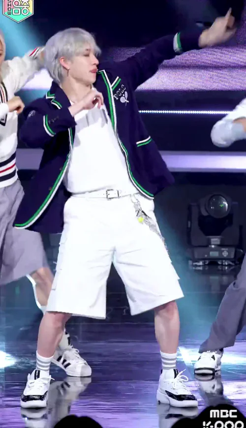 Sporty Navy Blazer with White Shorts and Sneakers for a Casual Yet Structured Look