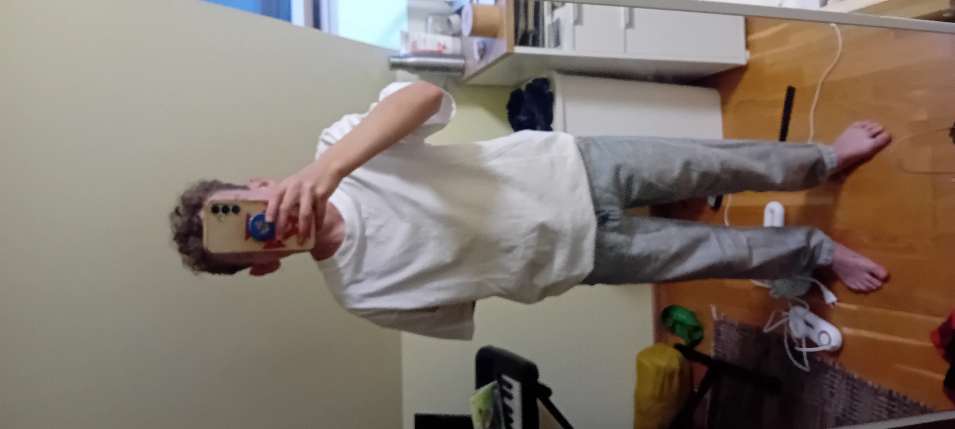 Casual White Tee and Grey Pants Ensemble with Tips to Elevate