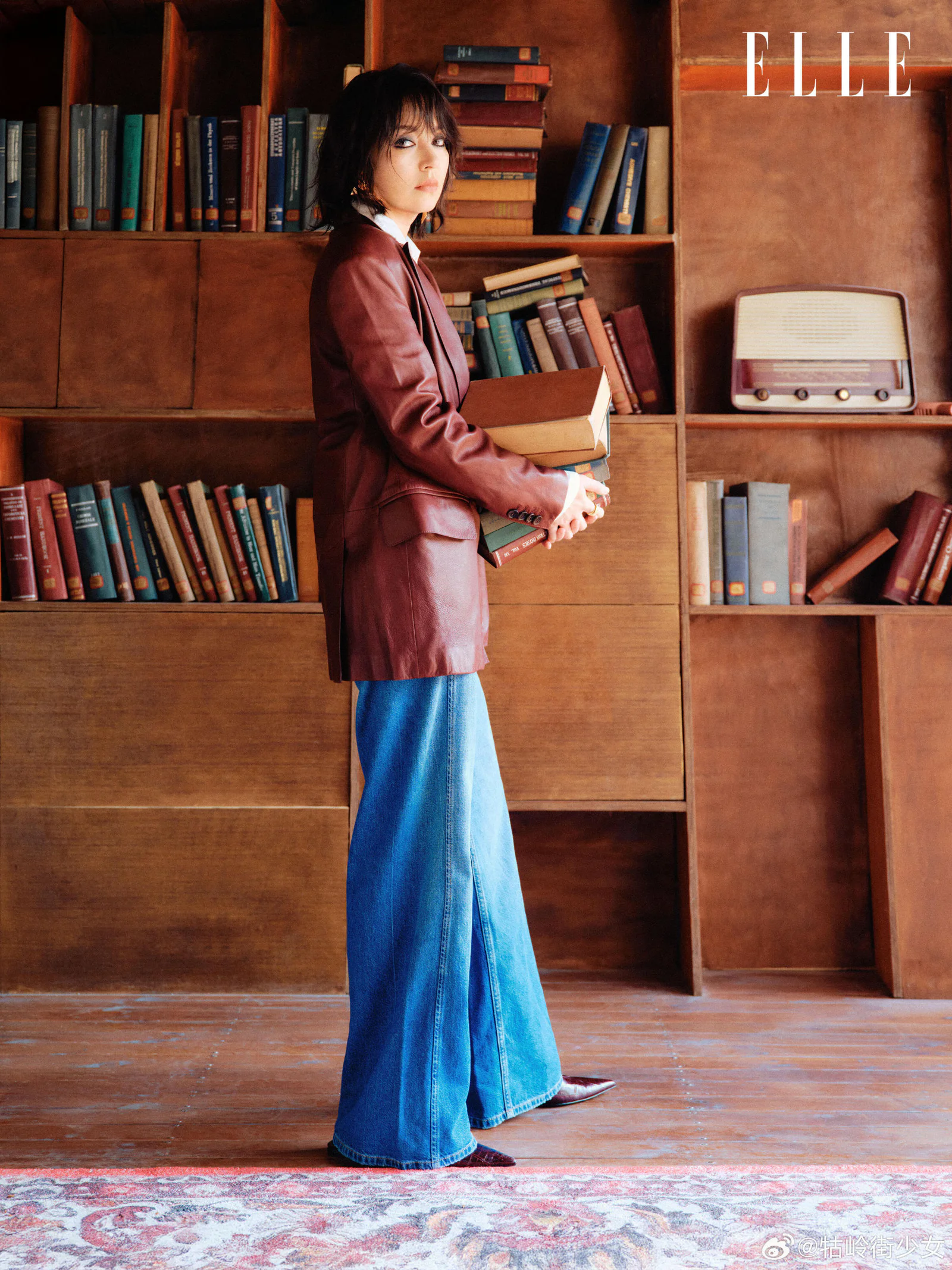 Chic Retro Vibes: Maroon Leather Blazer with Blue Wide-Leg Jeans