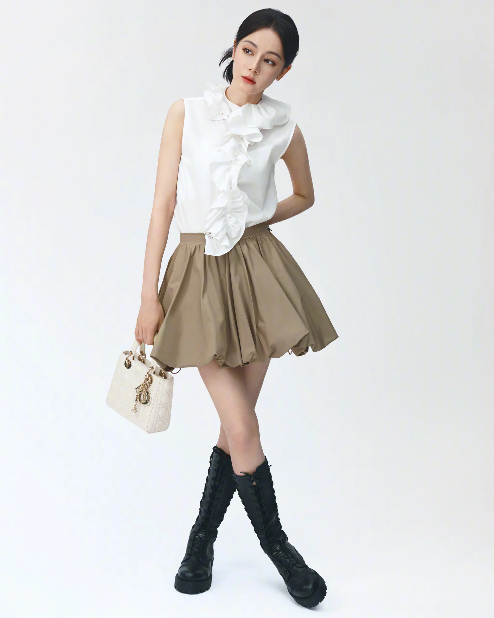 Modern Chic Ensemble with White Ruffled Top and Khaki Skirt