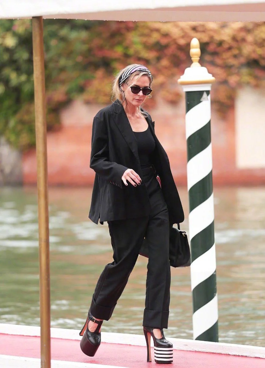 #Venice Film Festival# Rebecca Ferguso. Sophisticated Black Blazer and Trousers with Striking Platform Shoes