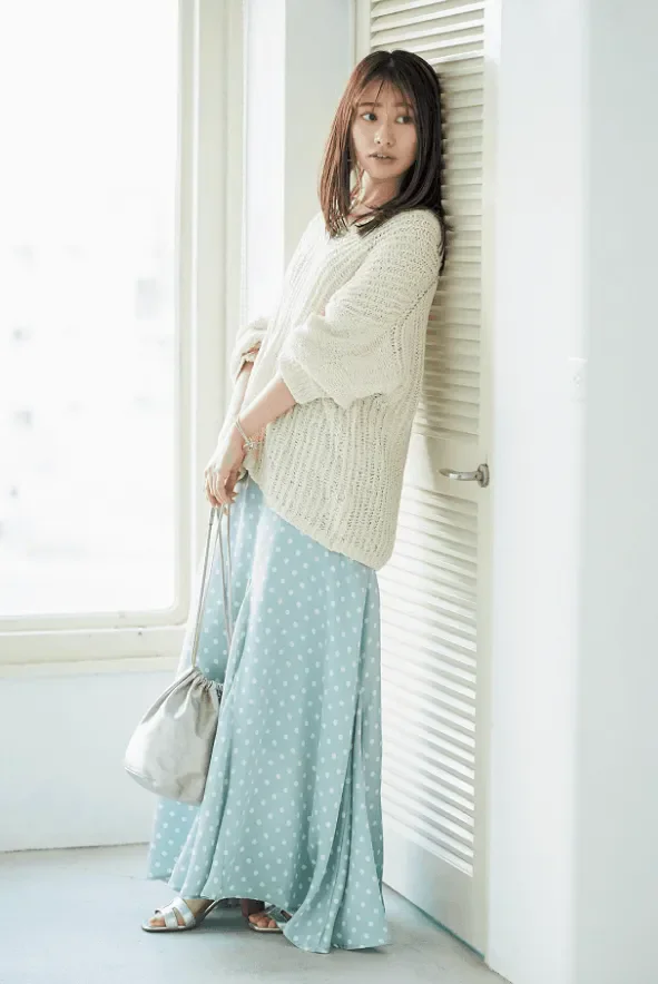 Cozy Cream Knit Sweater with Blue Polka Dot Maxi Skirt for Effortless Style