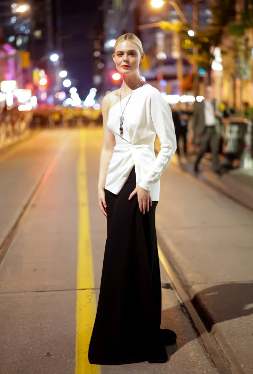 Elegant Asymmetrical White Top with Classic Long Black Skirt for a Modern Formal Look