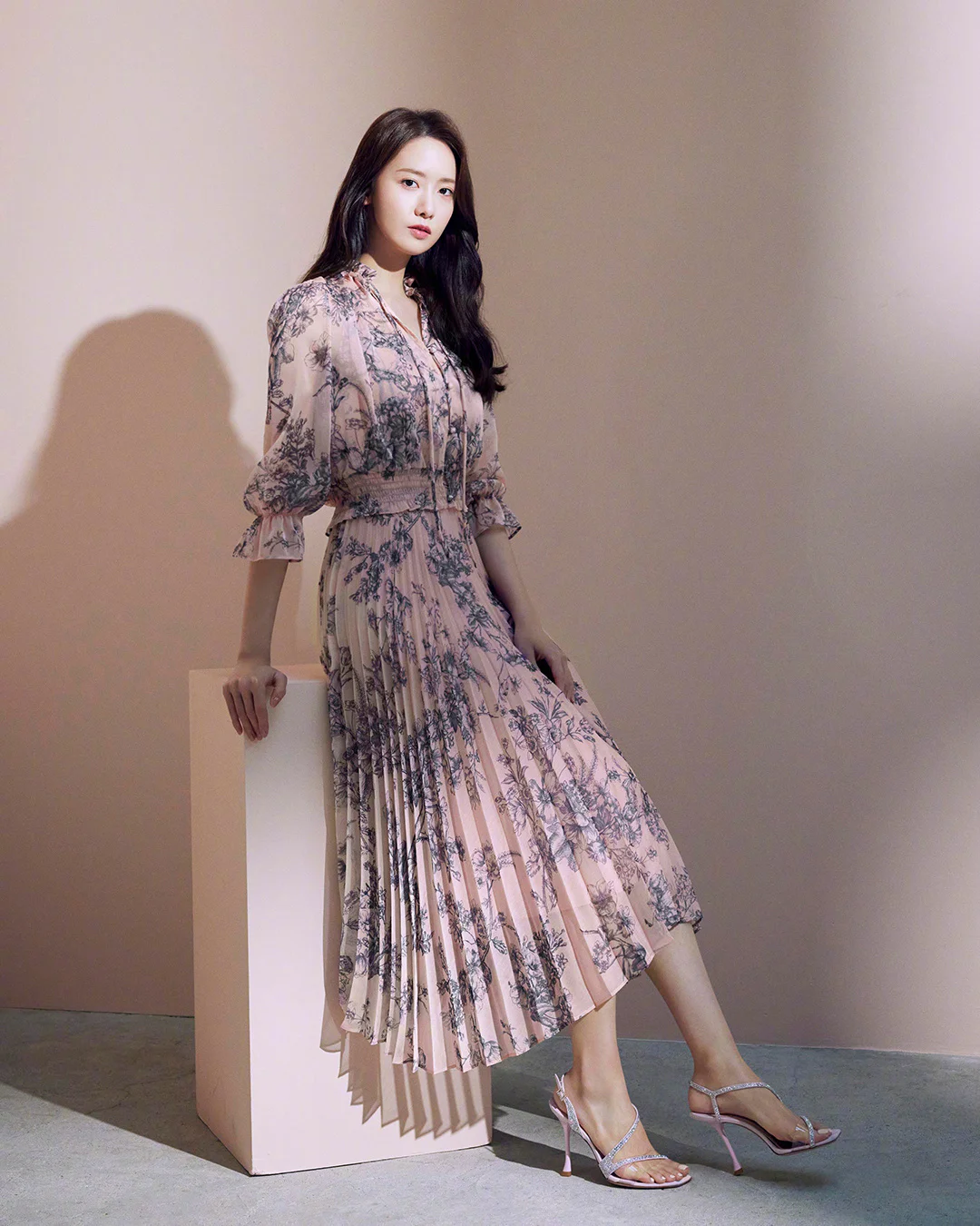 Elegant Floral Dress with Pleated Skirt and Strappy Sandals