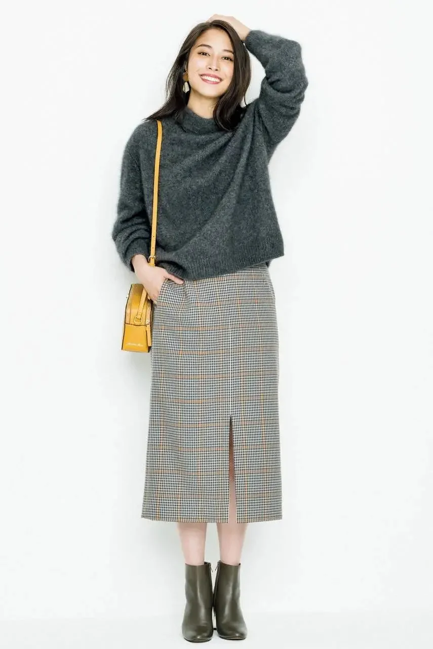 Chic Fall Ensemble with Charcoal Sweater, Checkered Skirt, and Yellow Bag