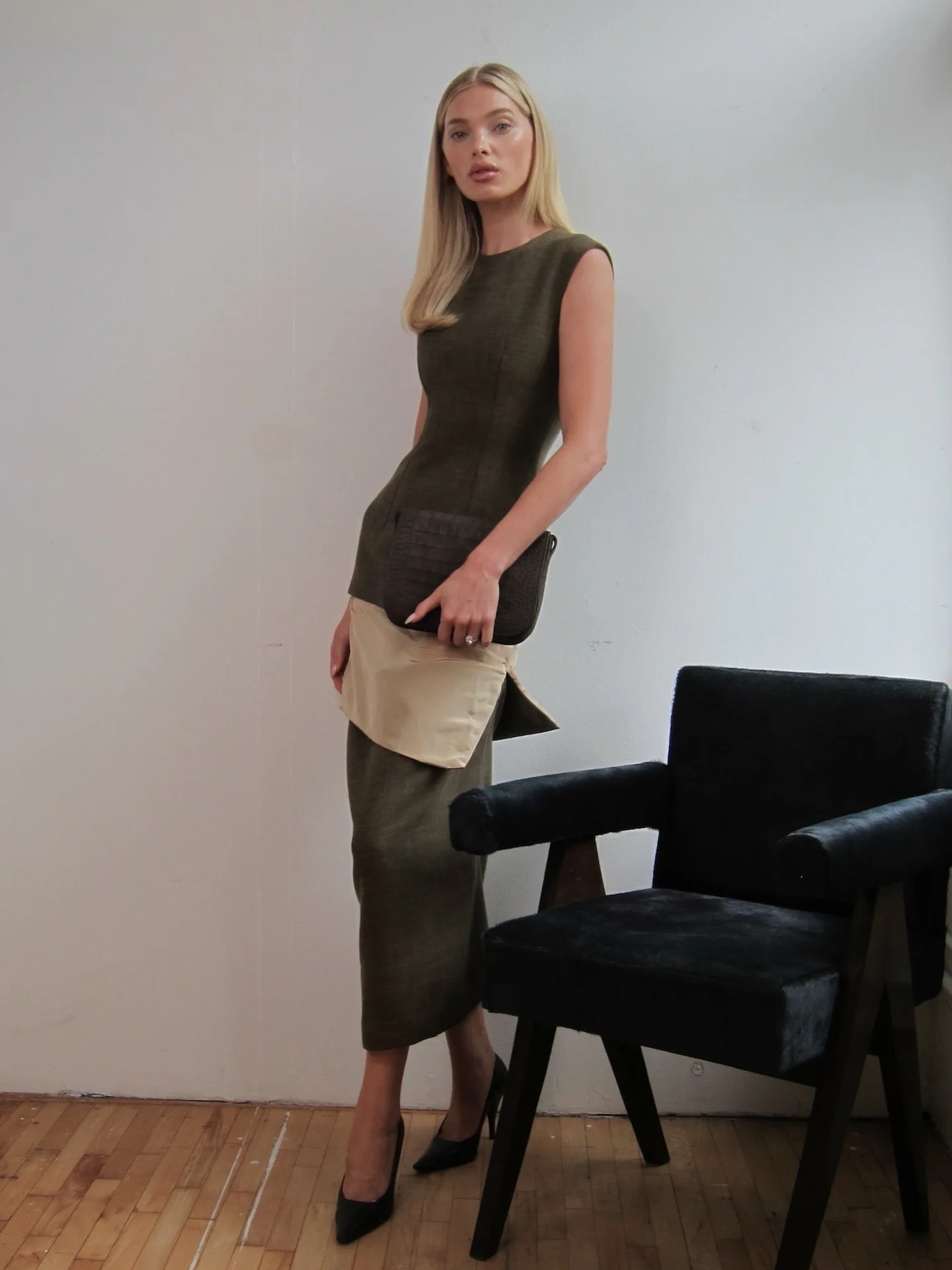 Minimalist Olive Green Dress with Asymmetrical Tan Detail and Black Pumps
