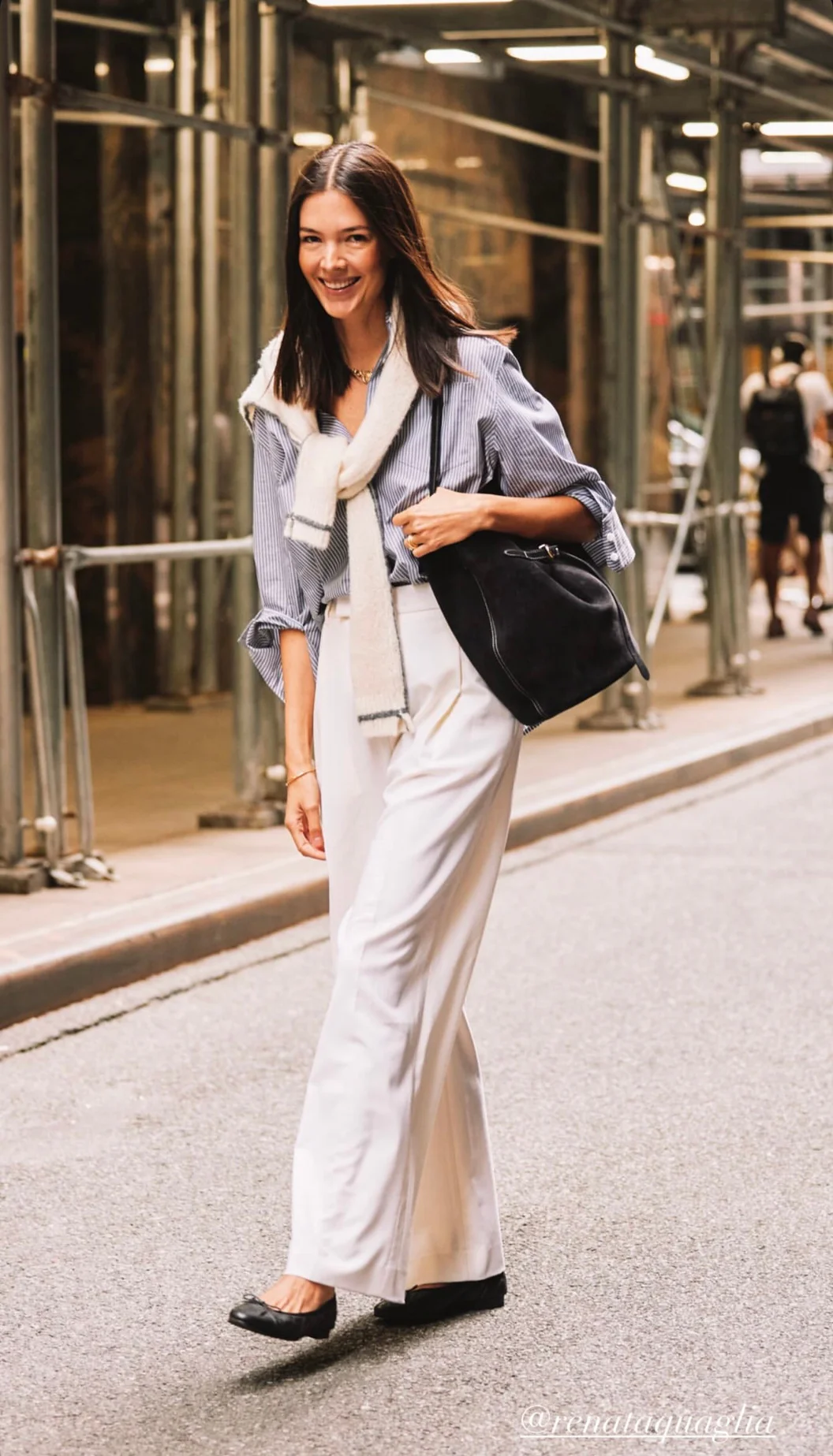 Chic Striped Shirt and White Trousers with Black Accessories for Urban Sophistication